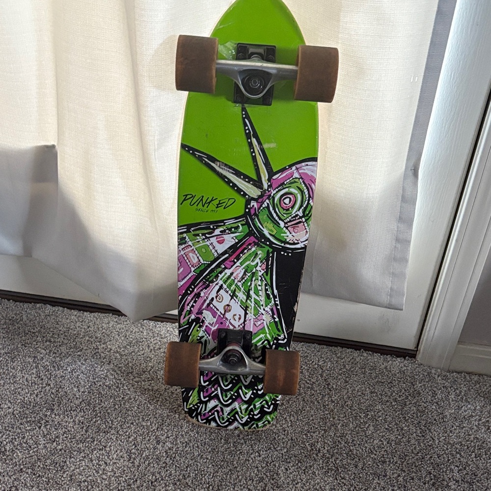 Punked Green and Pink Graphic Skateboard